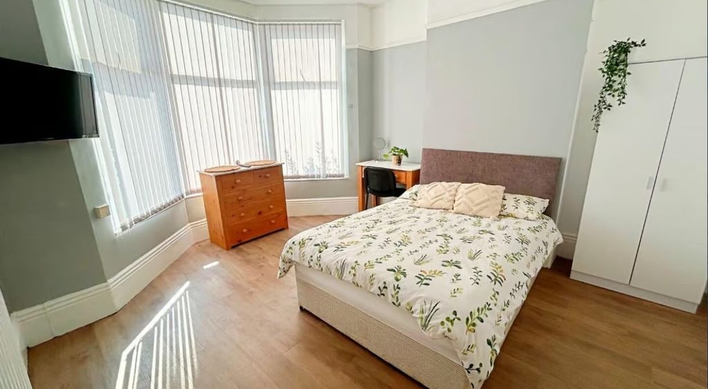 Property photo 1 of 10 Bright And Inviting Double Bedroom Featuring Ample...