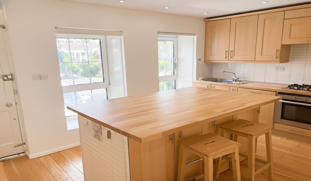 Property photo 3 of 21 Kitchen With Island With Seating Both Sides