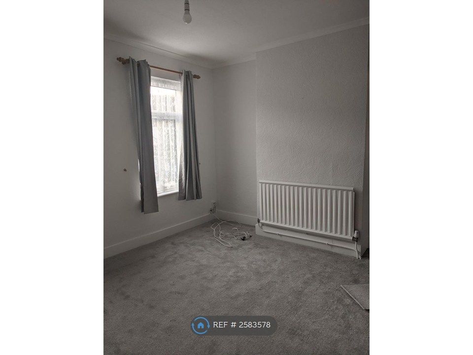 Property photo 2 of 11 Front Bedroom