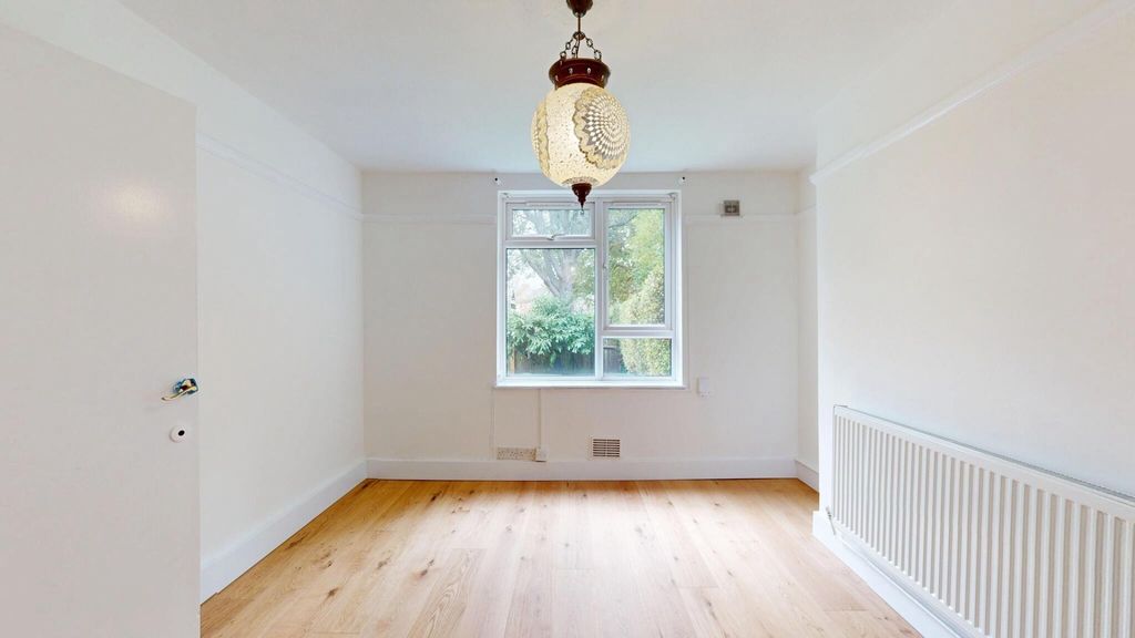 Property photo 2 of 13 Bright And Airy Master Bedroom Featuring A Large W...