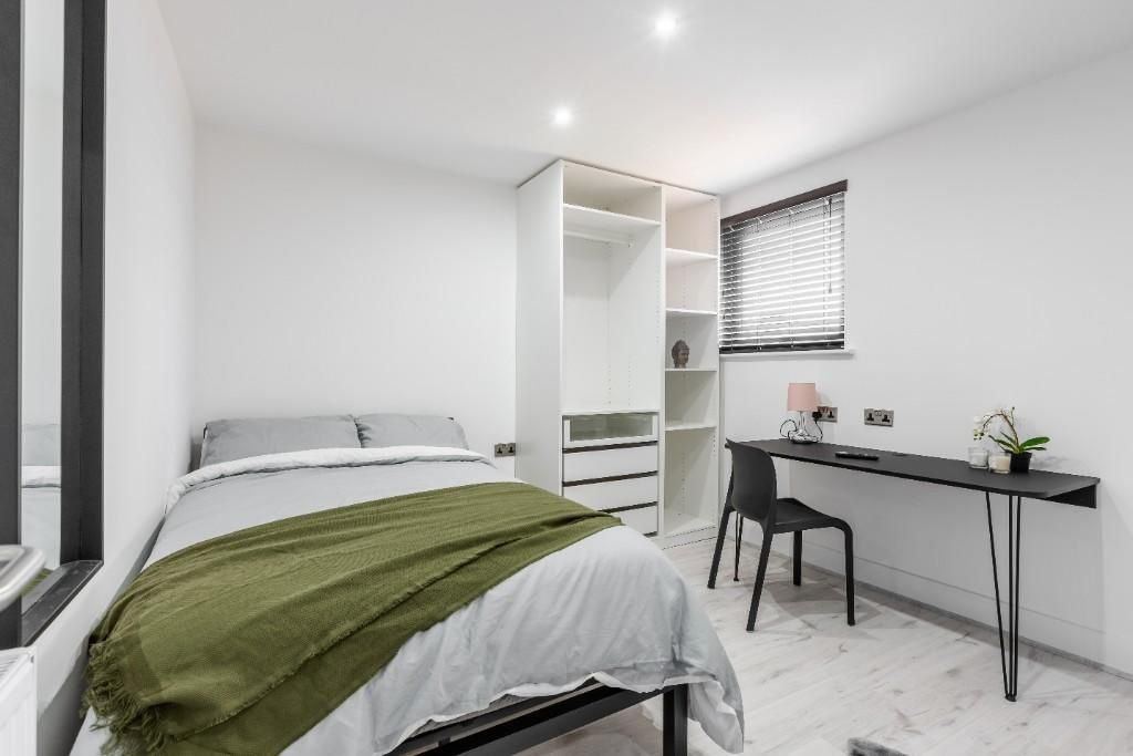 Property photo 2 of 15 A Bright And Tidy Bedroom Featuring A Comfortable ...