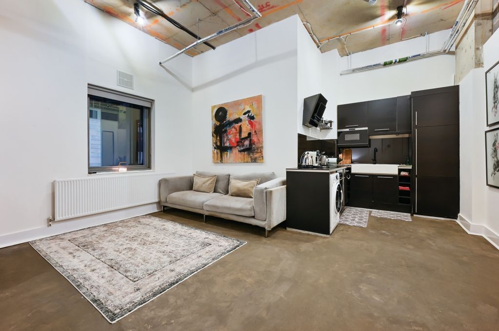 Property photo 2 of 10 Living Area