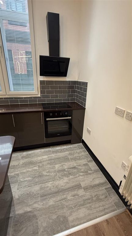 Property photo 3 of 9 Kitchen