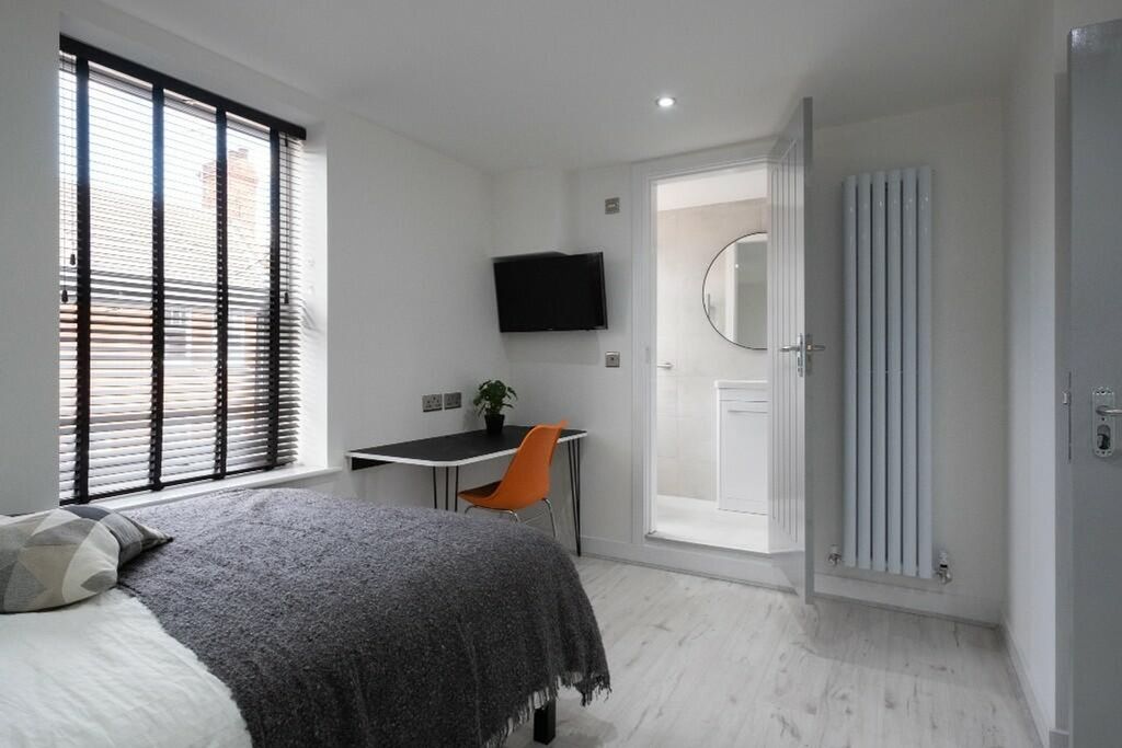 Property photo 3 of 14 This Modern Double Bedroom Features Large Windows ...