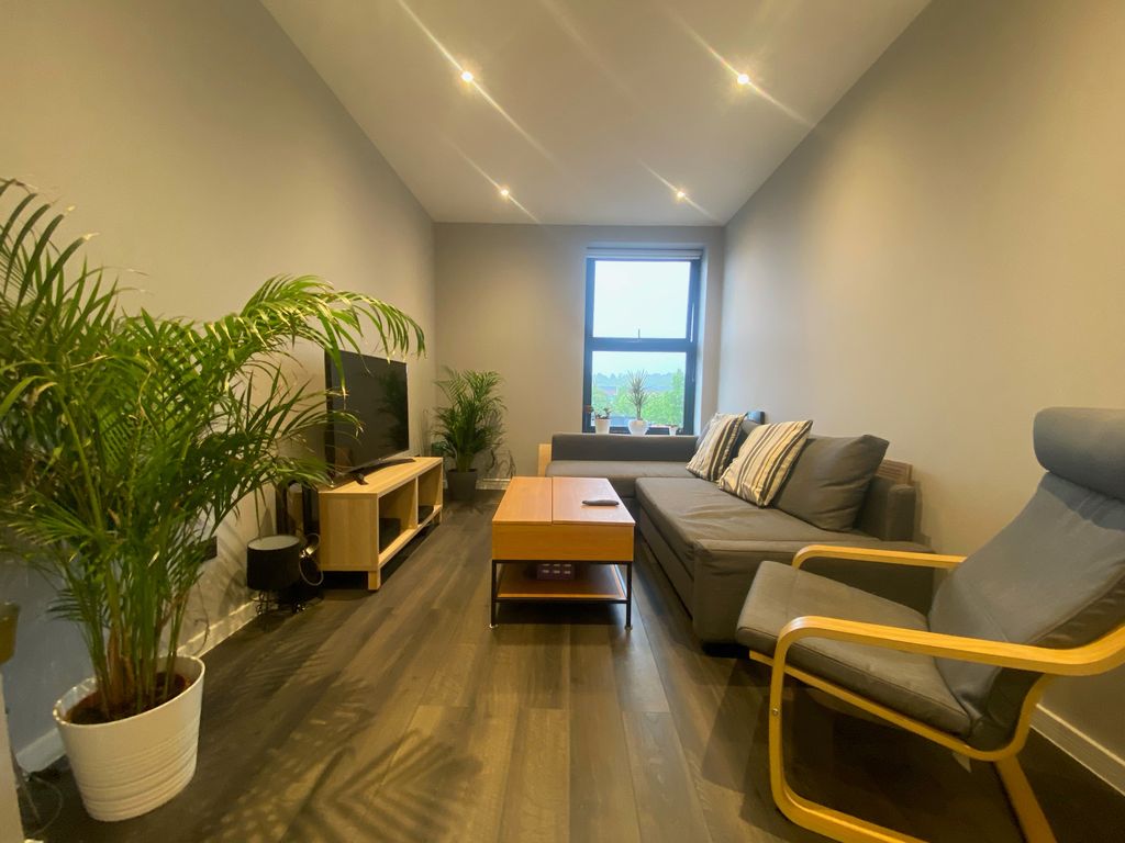 Property photo 3 of 6 Living Room 2