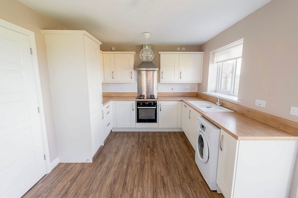 Property photo 3 of 13 Kitchen