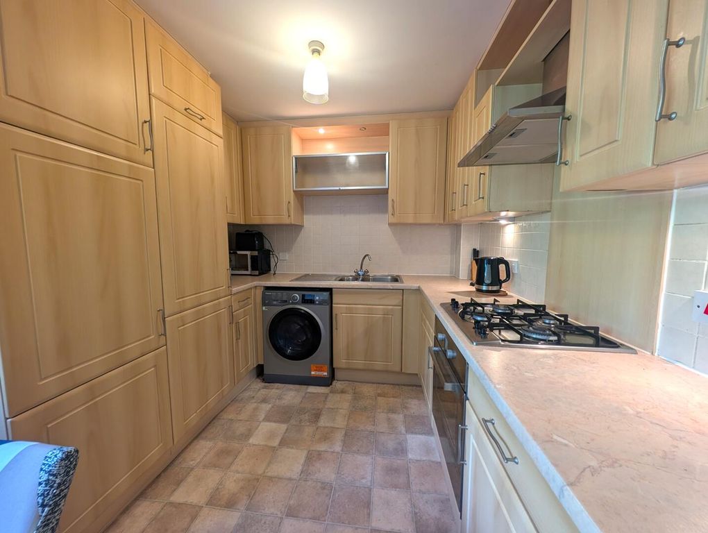 Property photo 3 of 7 Kitchen