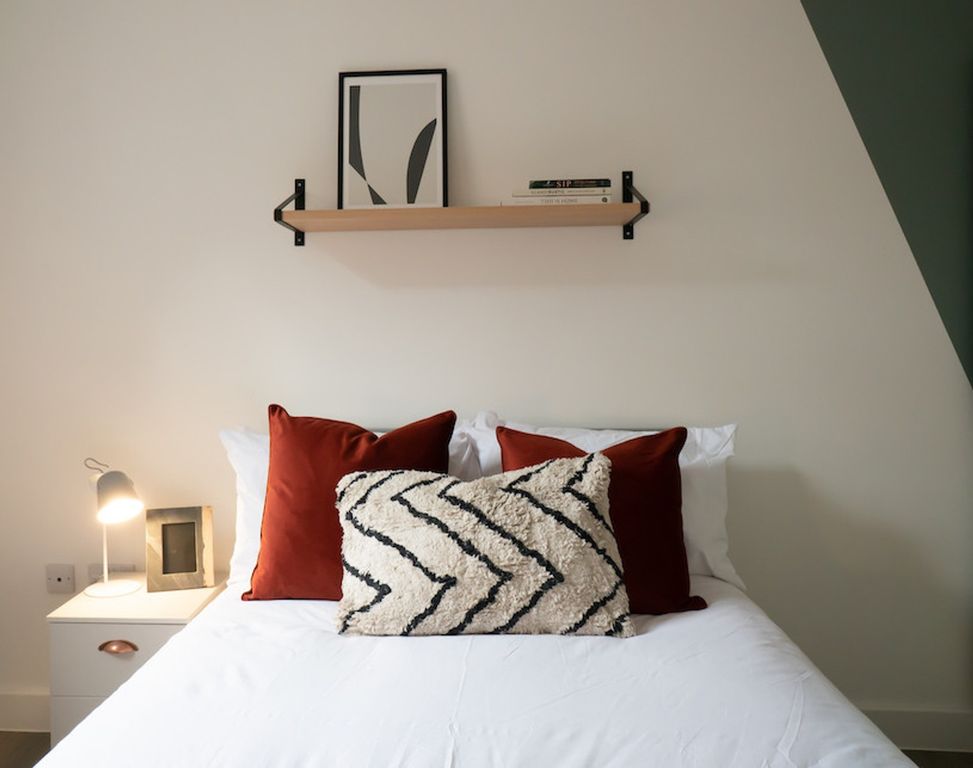 Property photo 3 of 5 A Stylish And Inviting Double Bedroom Featuring Mo...