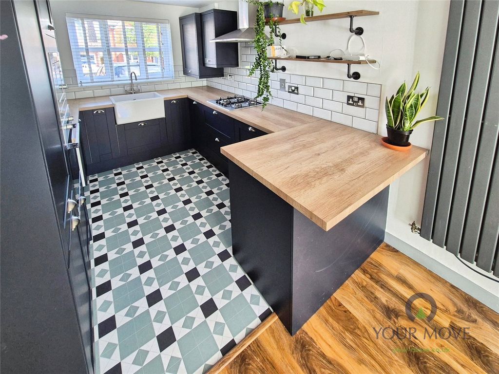 Property photo 2 of 12 Kitchen Area