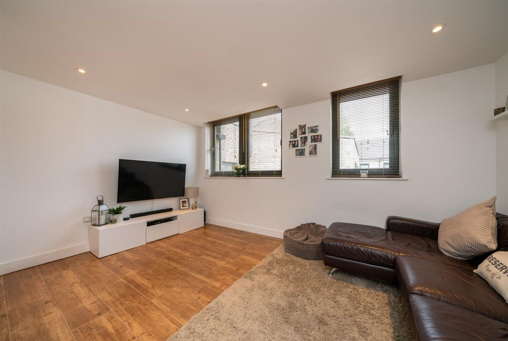 Property photo 3 of 8 Living Area