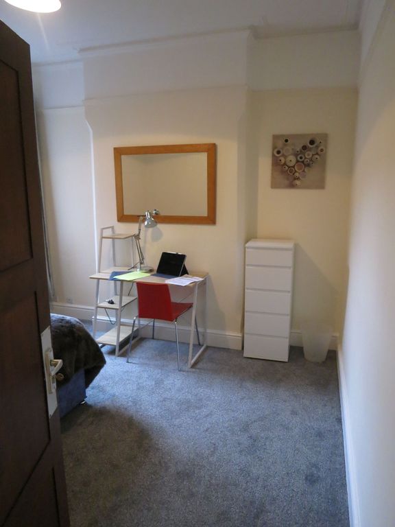 Property photo 1 of 22 Simple, Functional Workspace Featuring A Desk With...