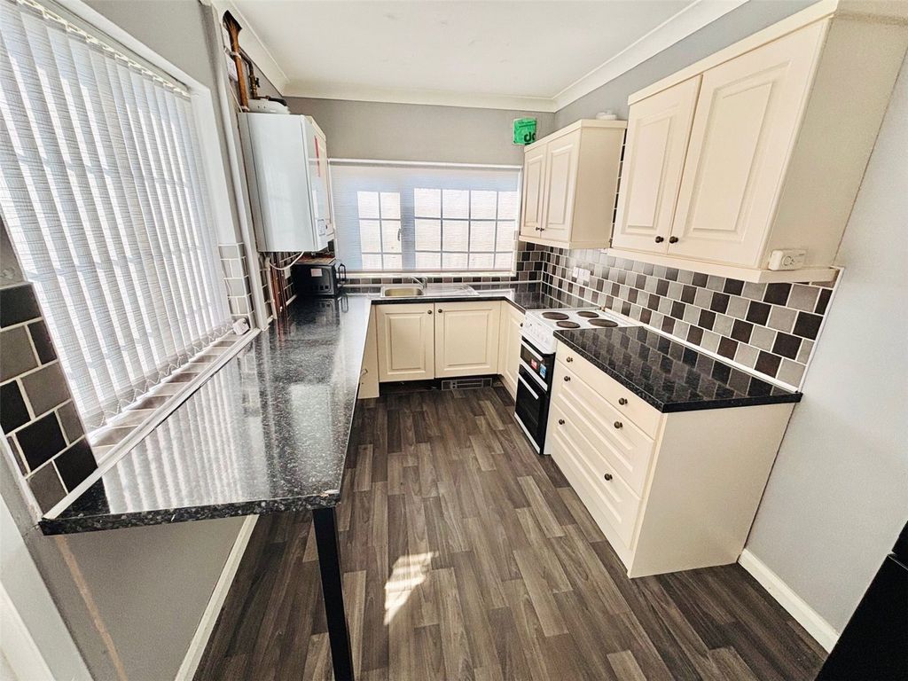 Property photo 2 of 12 Kitchen