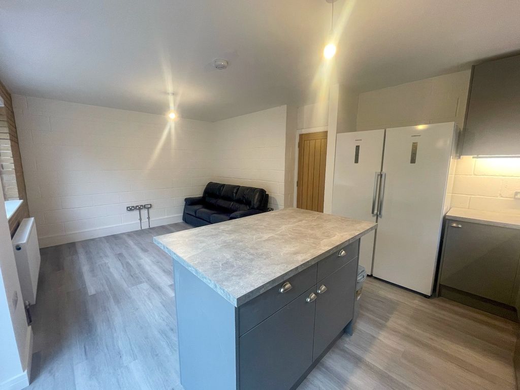 Property photo 3 of 13 This Inviting Living Area Features Ample Space For...