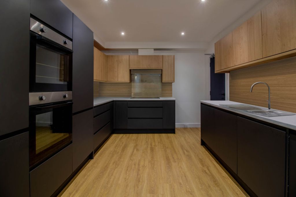 Property photo 3 of 9 Kitchen Area