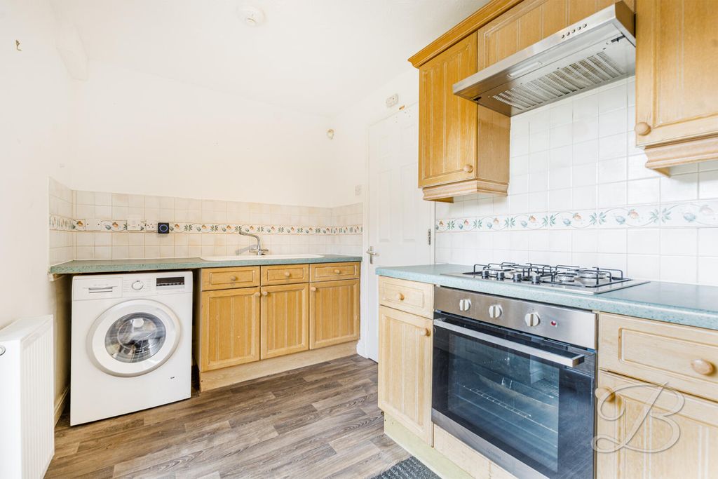 Property photo 3 of 17 Kitchen