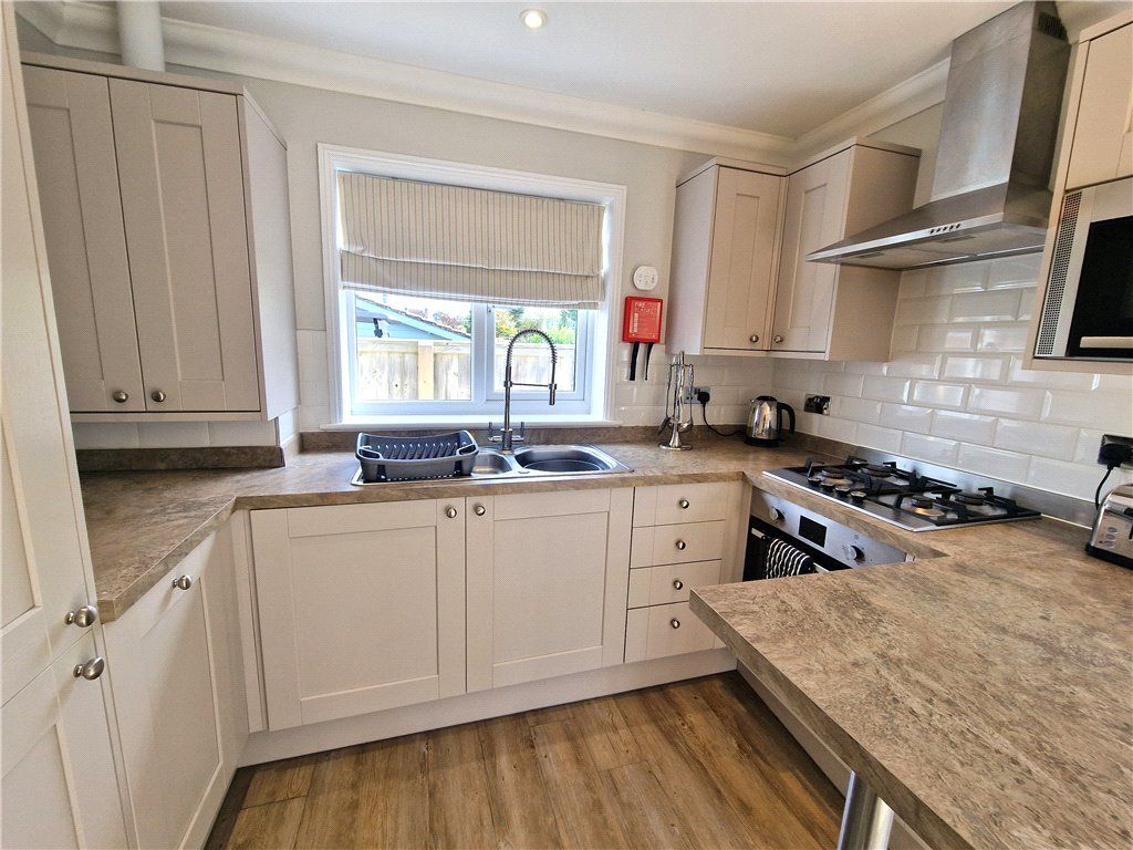 Property photo 3 of 12 Kitchen