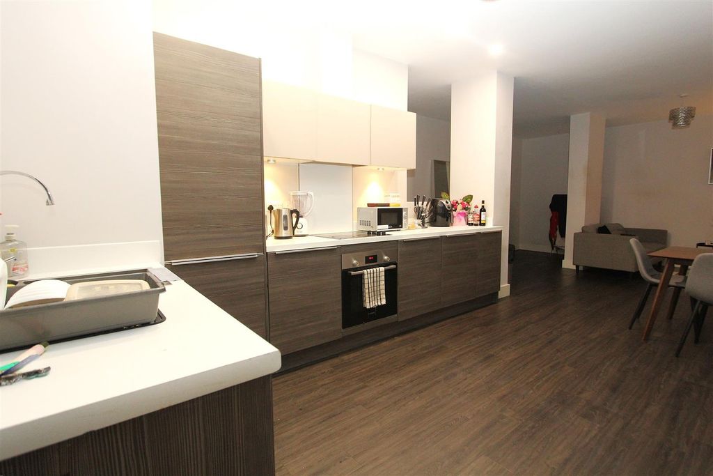 Property photo 2 of 9 Modern Open-Plan Kitchen With Sleek Finish...
