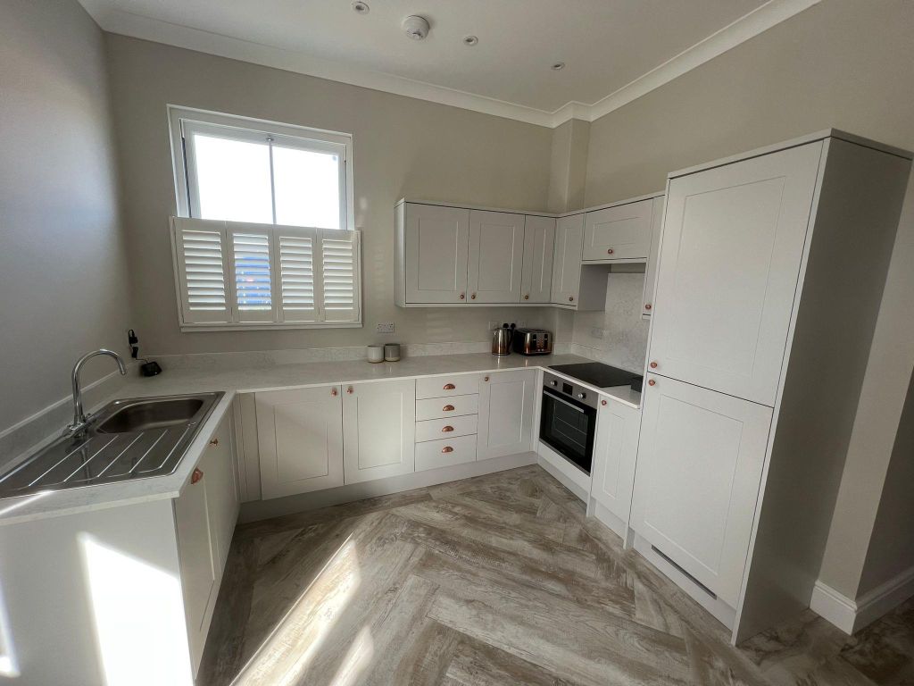 Property photo 2 of 8 Kitchen