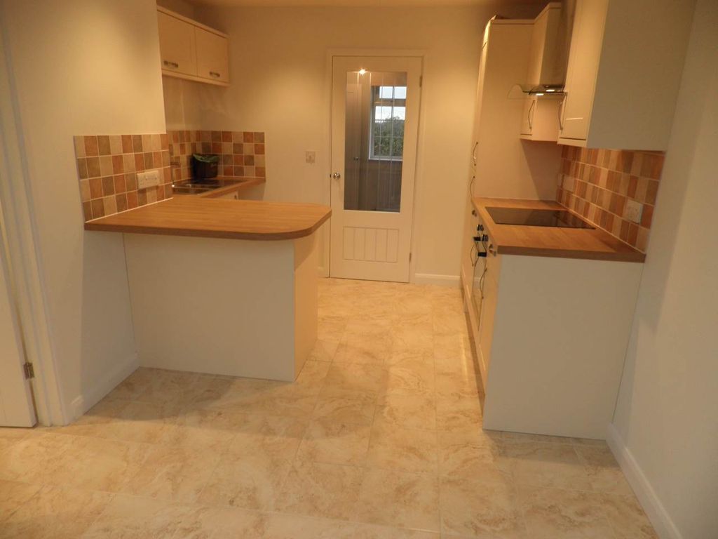 Property photo 2 of 8 Kitchen