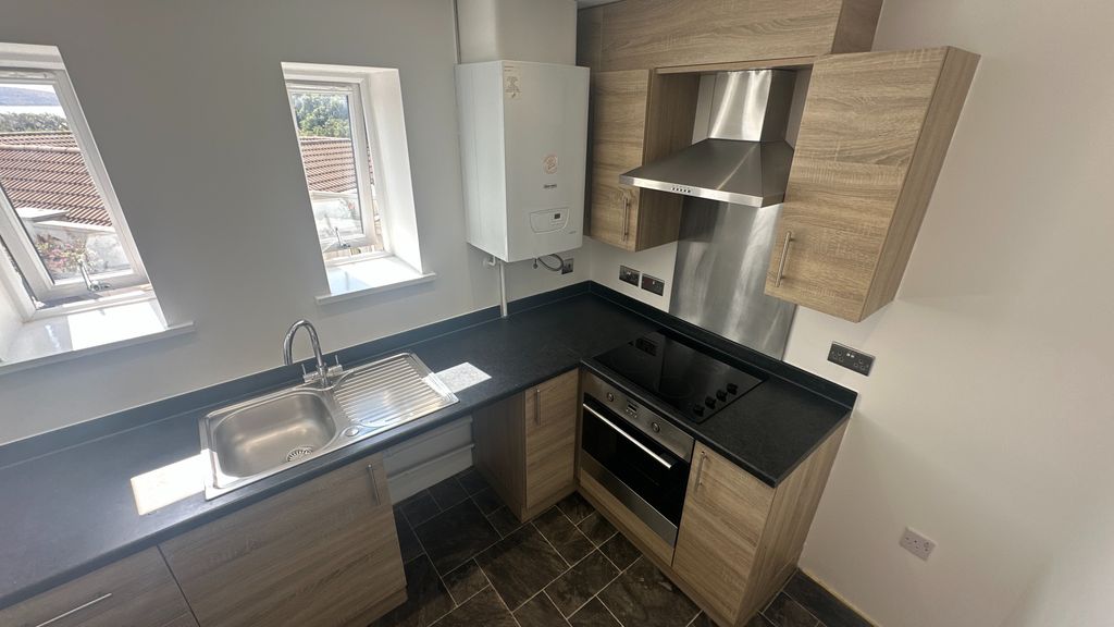 Property photo 3 of 9 Kitchen