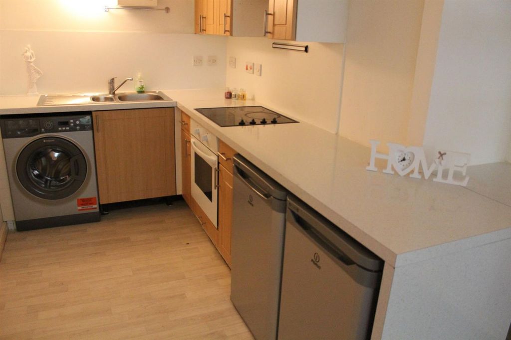 Property photo 3 of 13 Kitchen