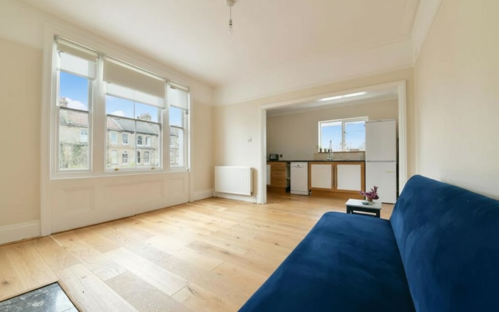 Property photo 2 of 11 Living Room And Kitchen