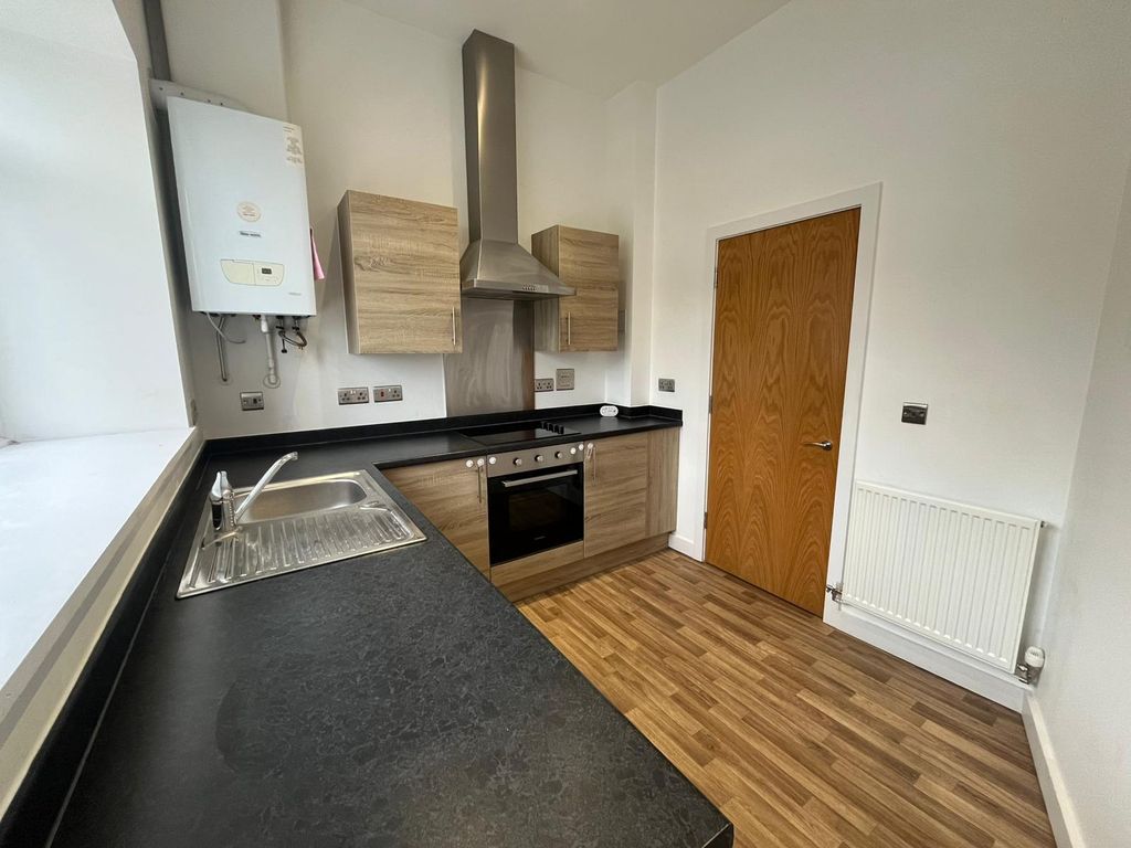 Property photo 2 of 8 Kitchen