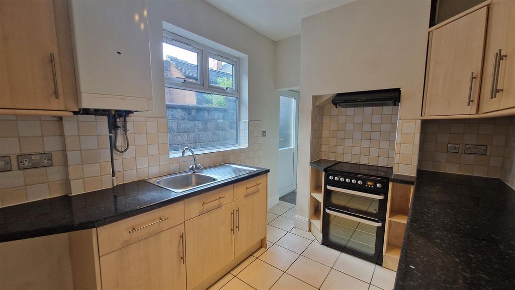 Property photo 3 of 13 Kitchen