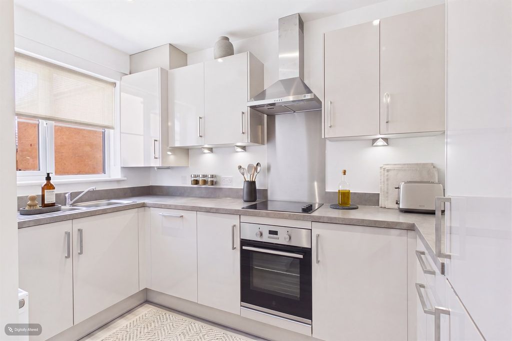 Property photo 3 of 7 Typical Kitchen