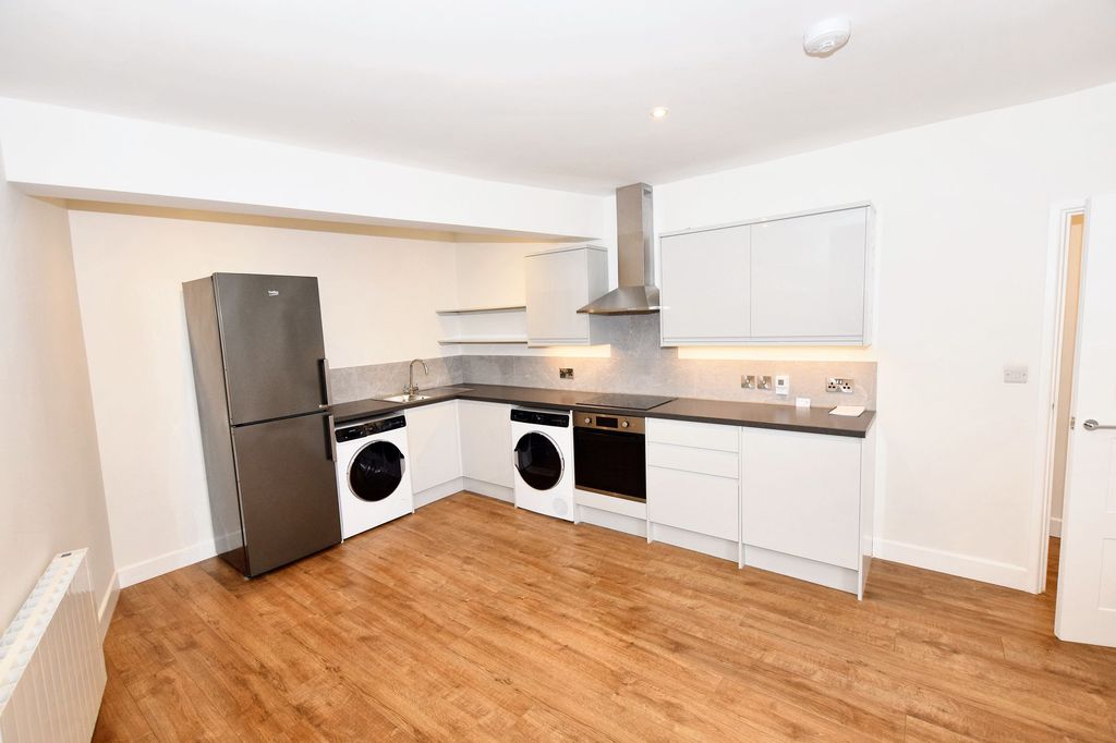 Property photo 3 of 7 Kitchen Area