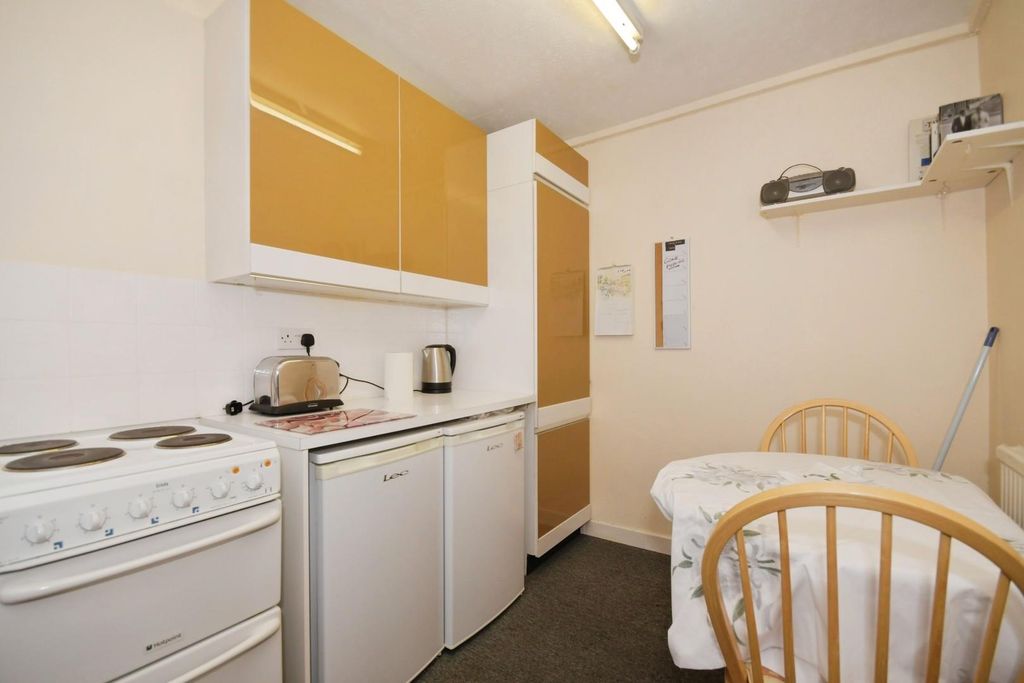 Property photo 3 of 13 Dining Kitchen