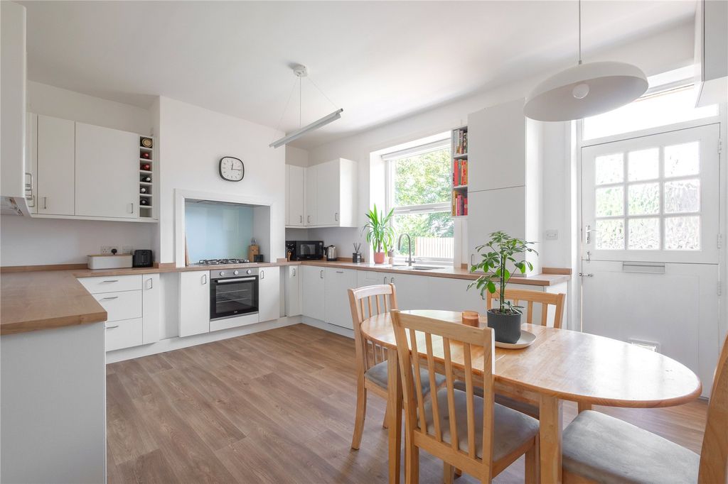 Property photo 3 of 21 Dining Kitchen