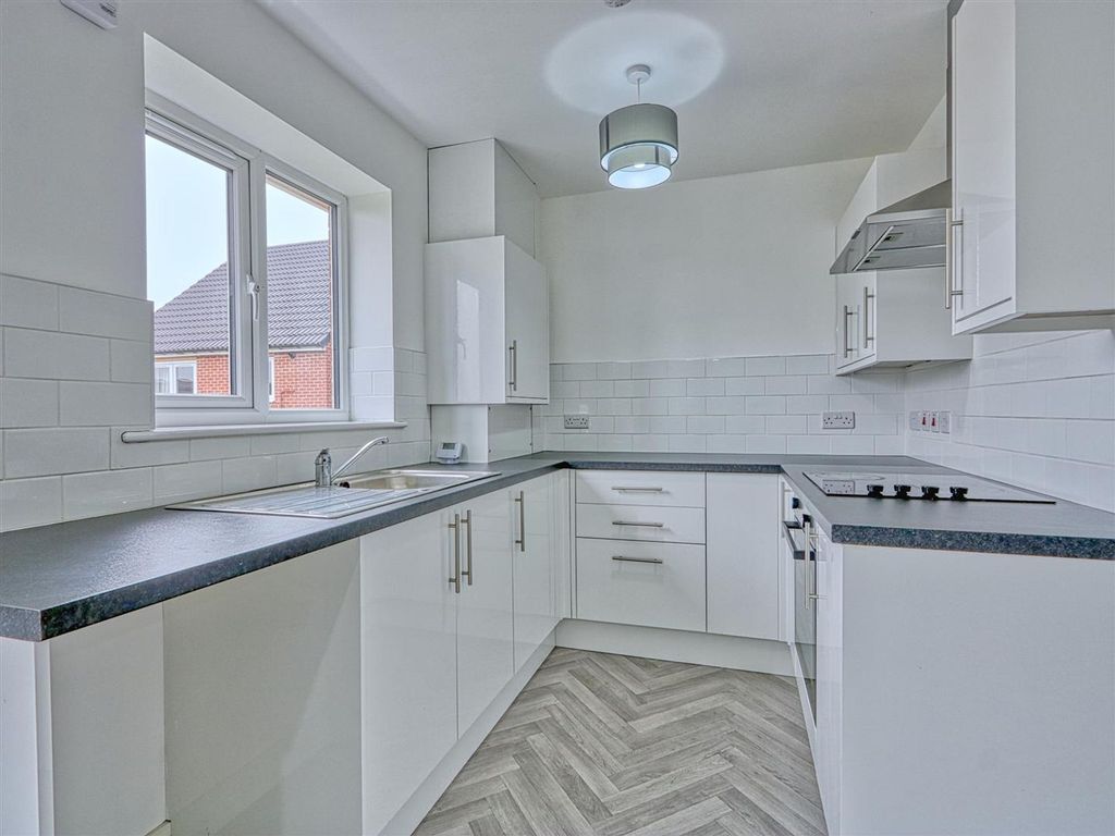 Property photo 2 of 13 Kitchen Area