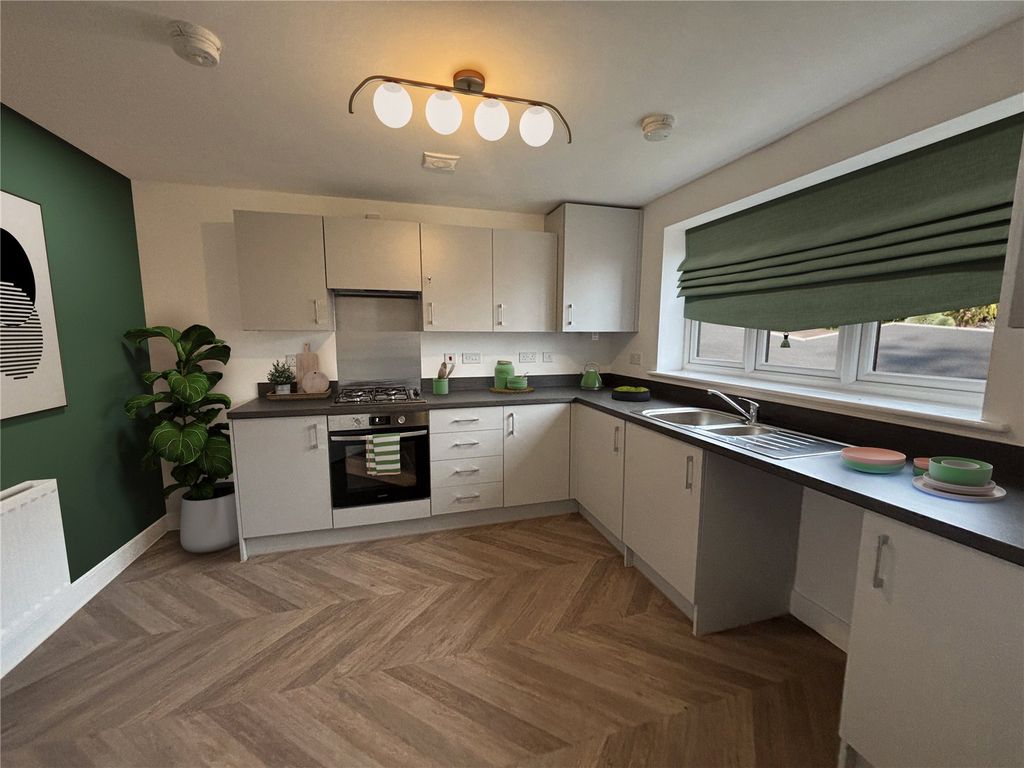 Property photo 2 of 10 Typical Kitchen