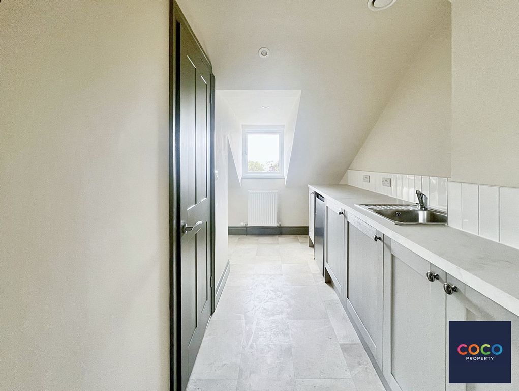 Property photo 3 of 4 Kitchen Area