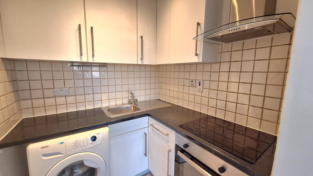 Property photo 2 of 8 Kitchen