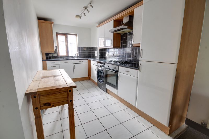 Property photo 1 of 8 Kitchen