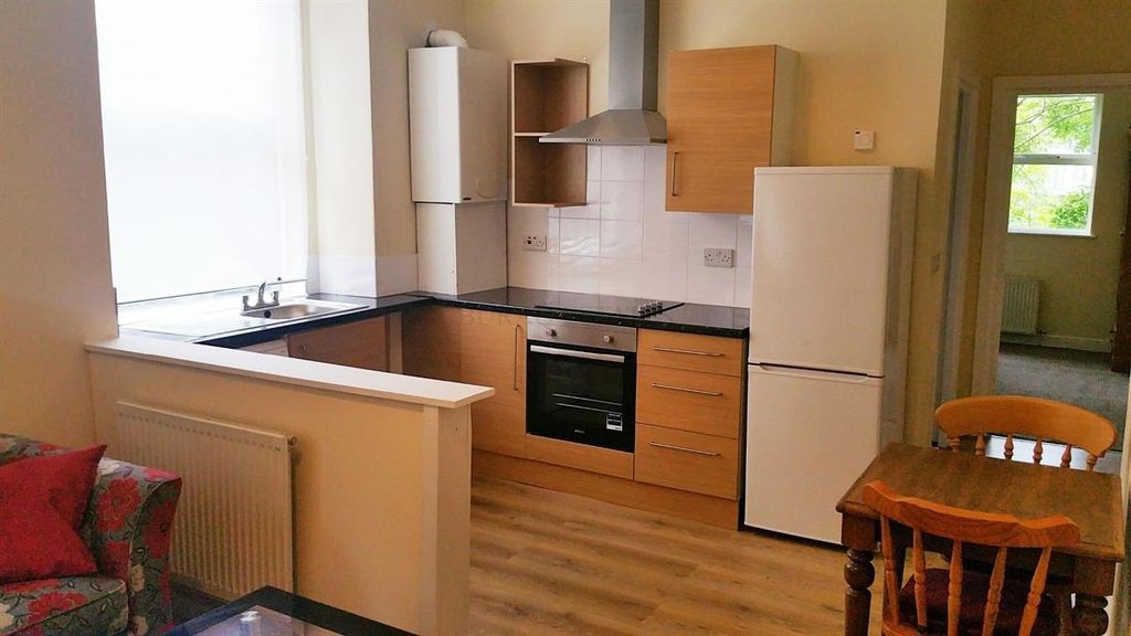 Property photo 1 of 5 Bright Kitchen With Modern Appliances And Dining...