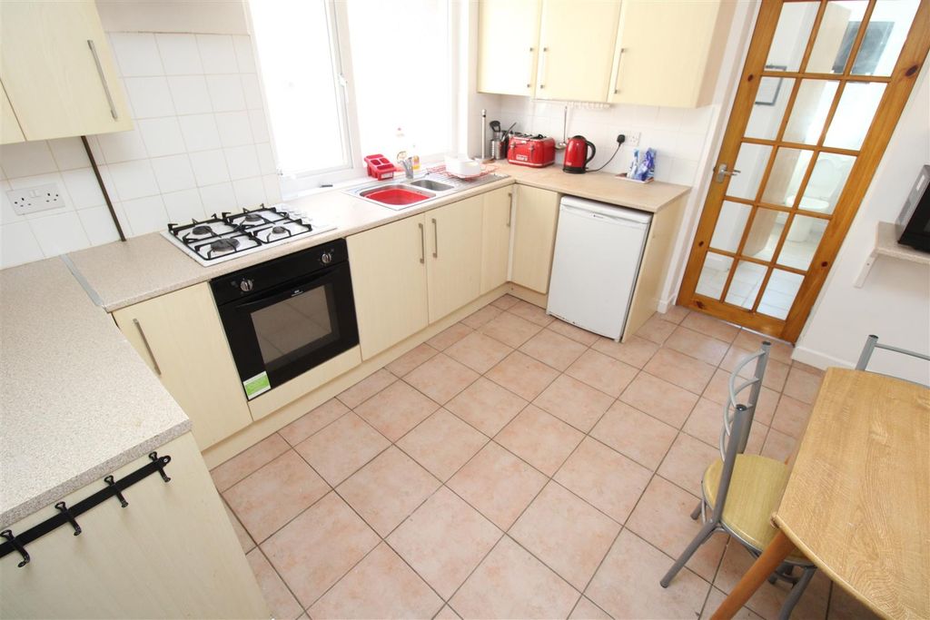 Property photo 1 of 10 Bright And Airy Kitchen With Ample Storage Space...