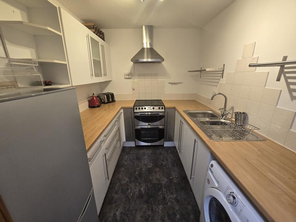 Property photo 3 of 7 Kitchen