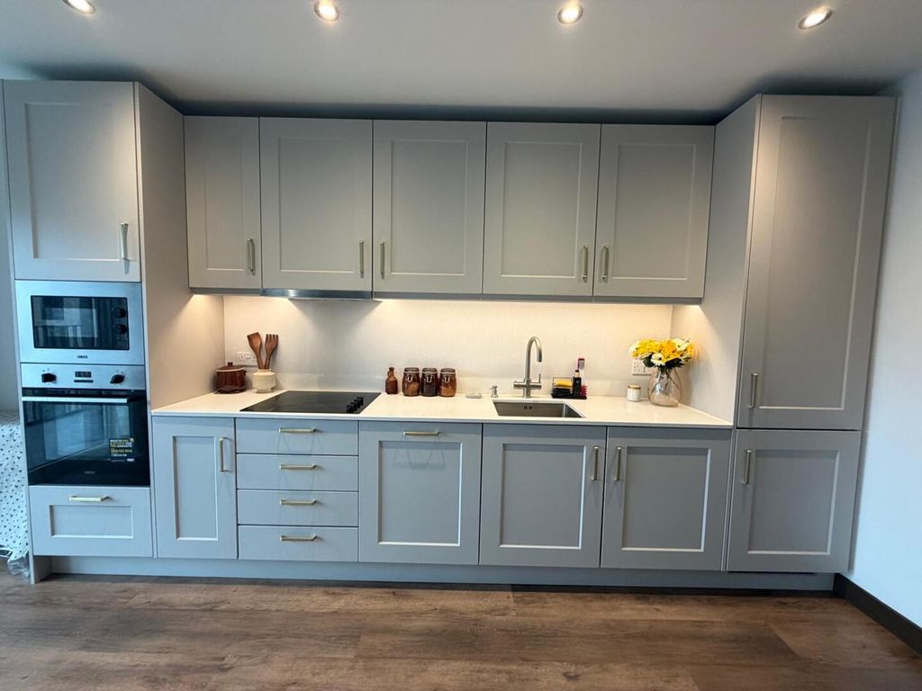 Property photo 3 of 12 Kitchen