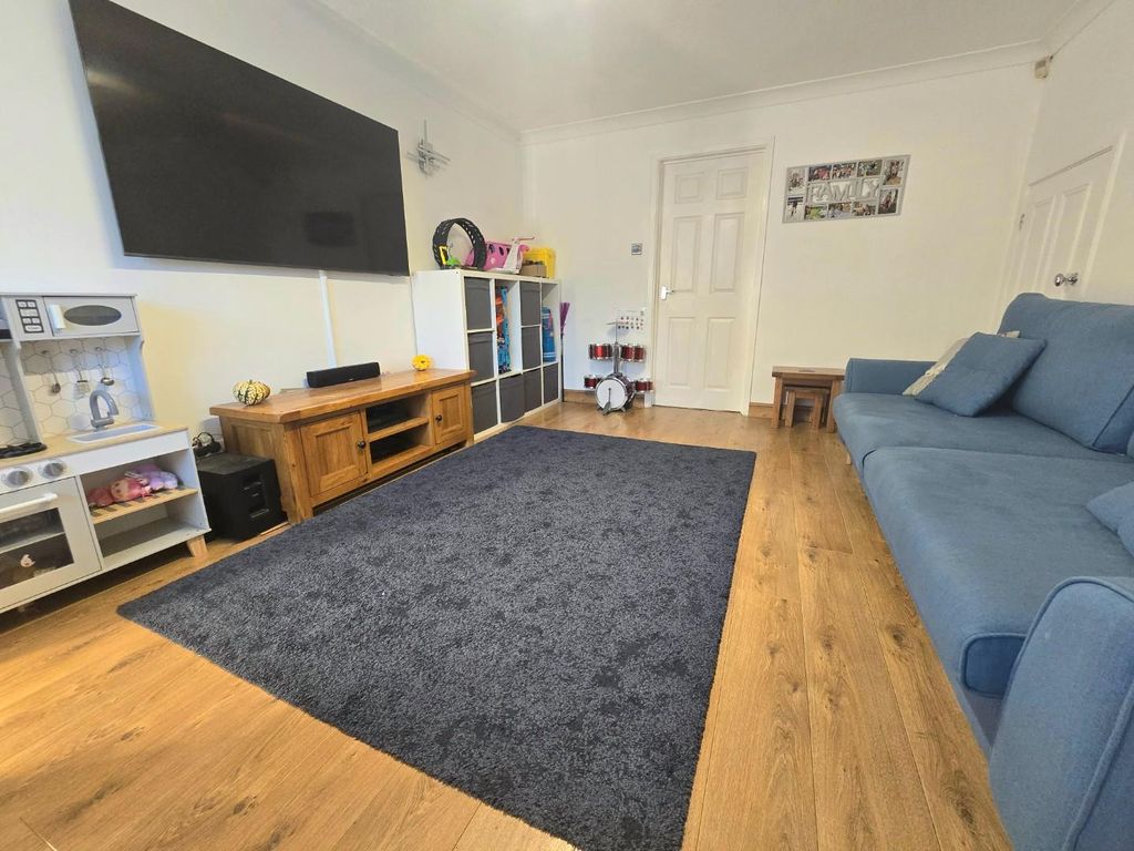 Property photo 3 of 13 Living Room 1