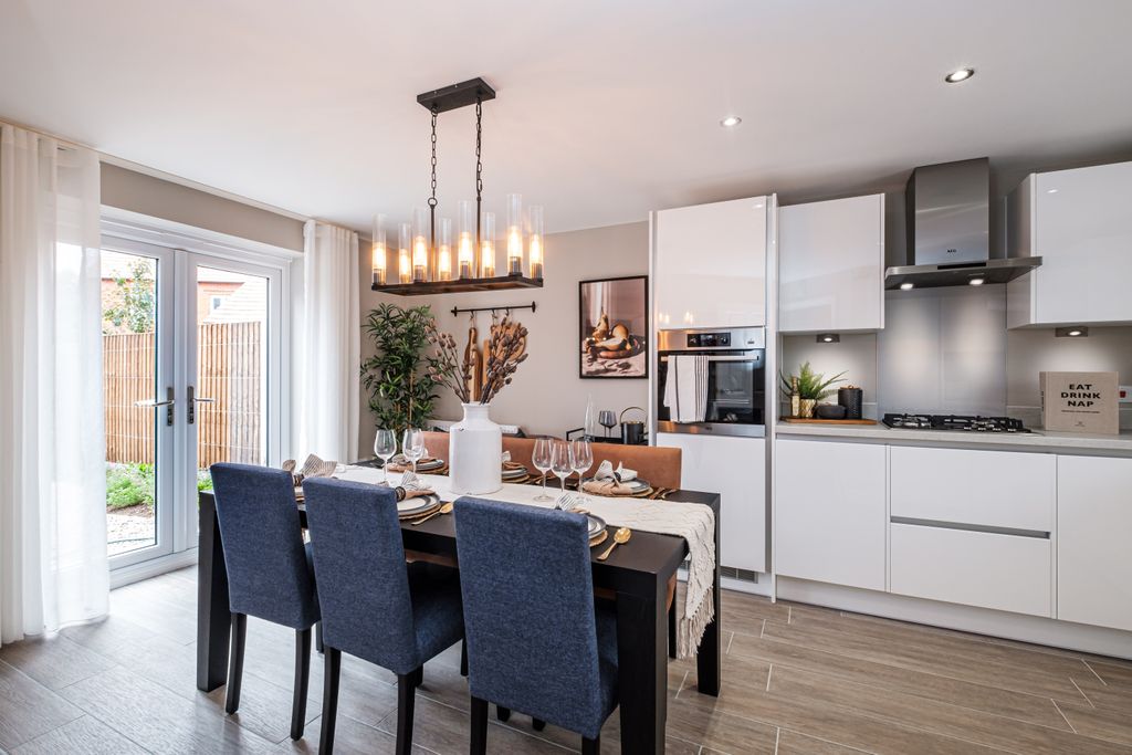 Property photo 2 of 9 White Kitchen With French Doors Showing The Garden