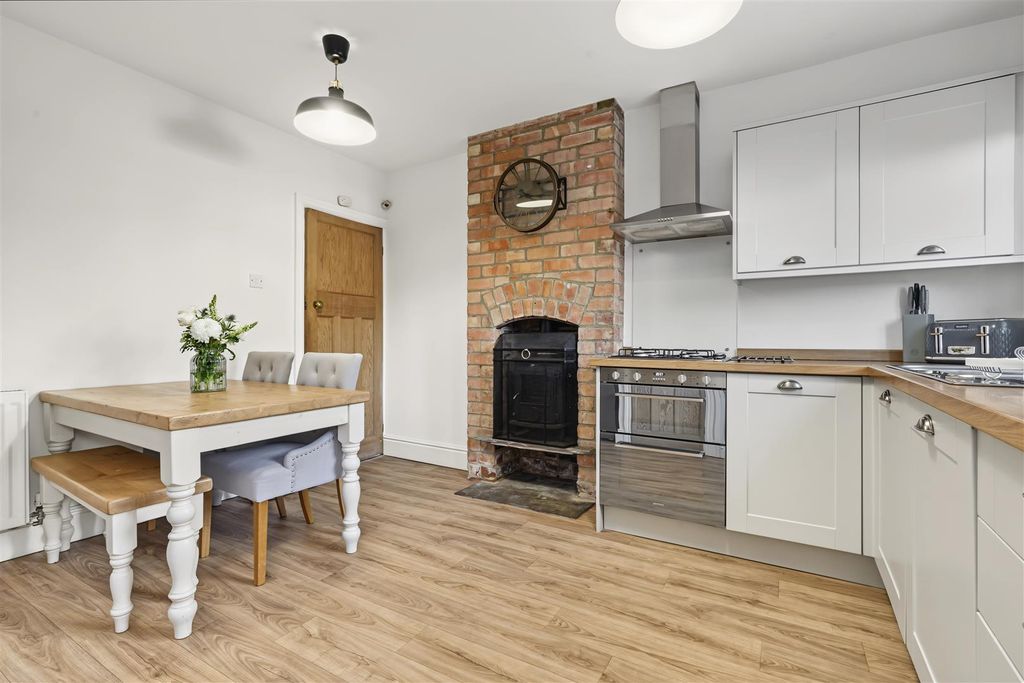 Property photo 3 of 13 Dining Kitchen