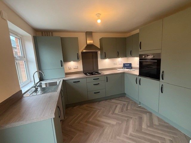 Property photo 2 of 12 Kitchen