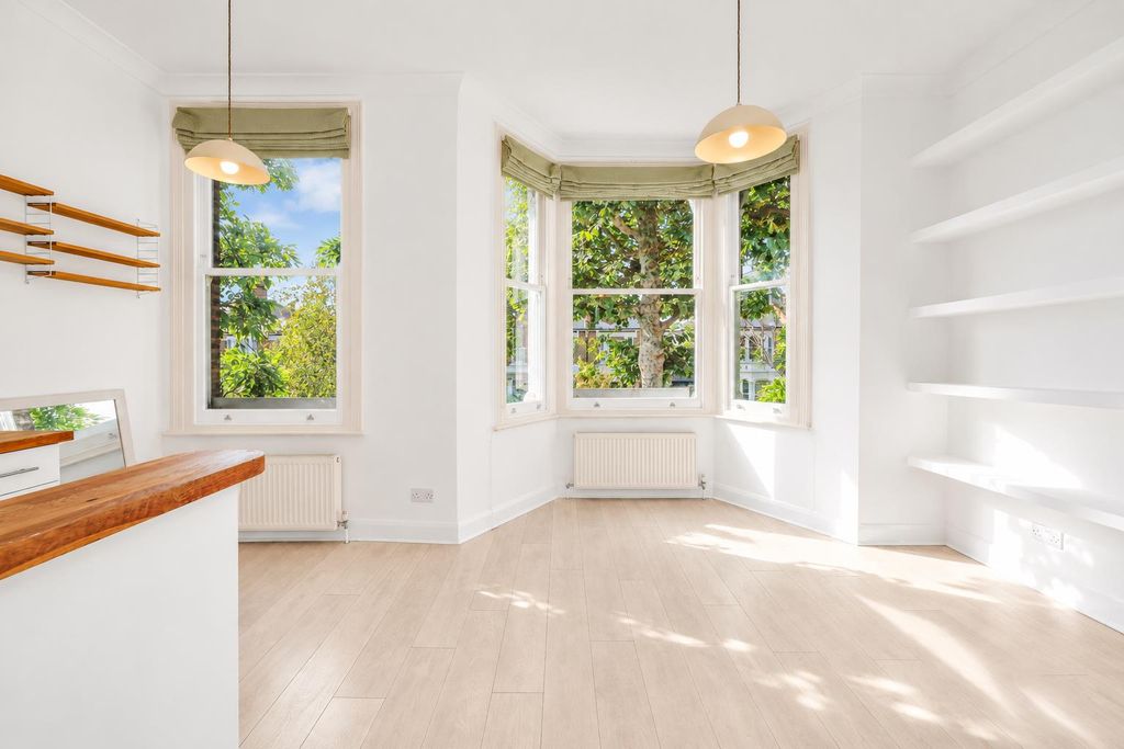 Property photo 2 of 10 Sunlit Minimalist Bay Window Interior.Png