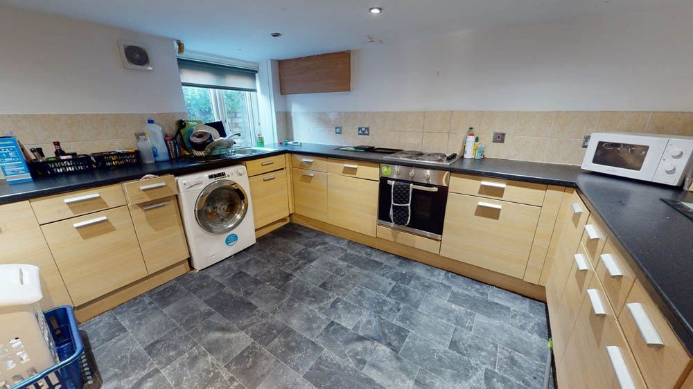 Property photo 1 of 7 Bright And Well-Organized Kitchen Featuring Ample ...