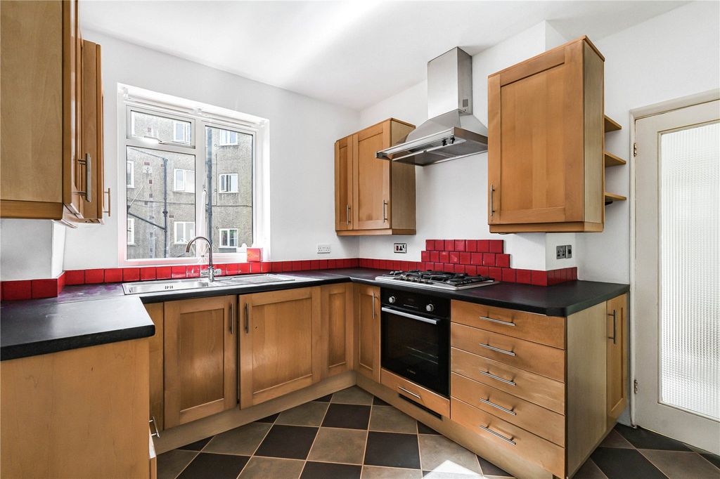 Property photo 3 of 12 Kitchen