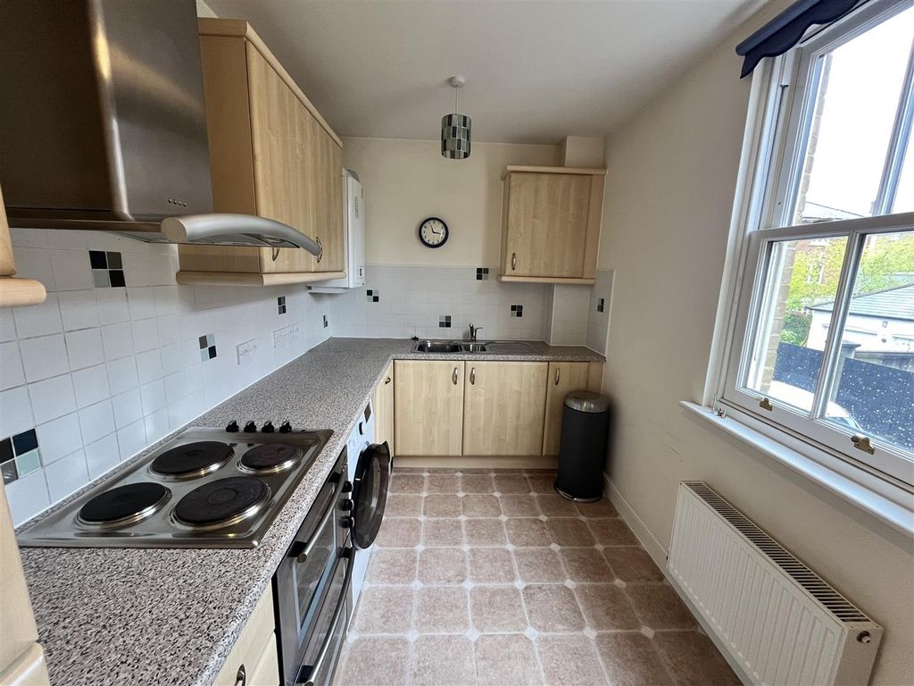 Property photo 3 of 12 Kitchen With Ample Cupboard Space