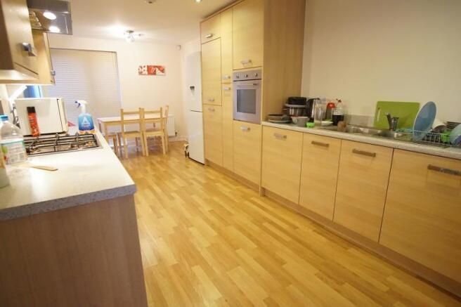 Property photo 2 of 11 A Well-Maintained Kitchen With Ample Counter Space...